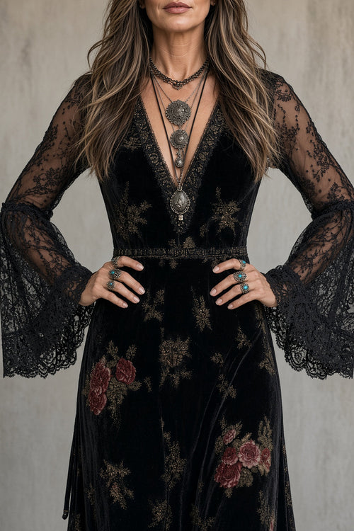 Amparo | vestido largo negro con estampado floral y mangas transparentes