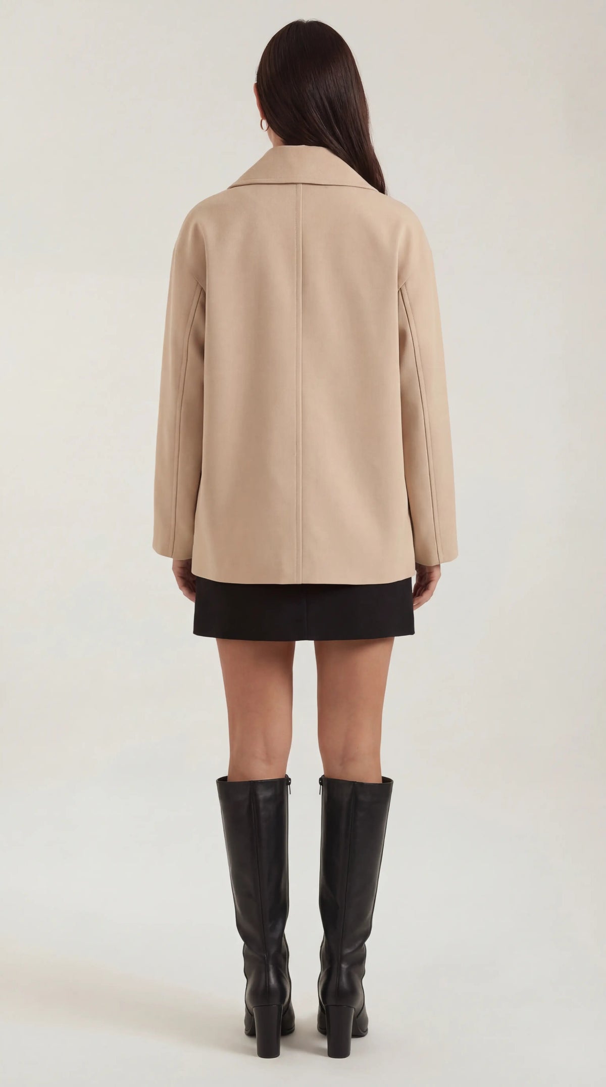 Rosa | abrigo oversized con botón asimétrico y bolsillos